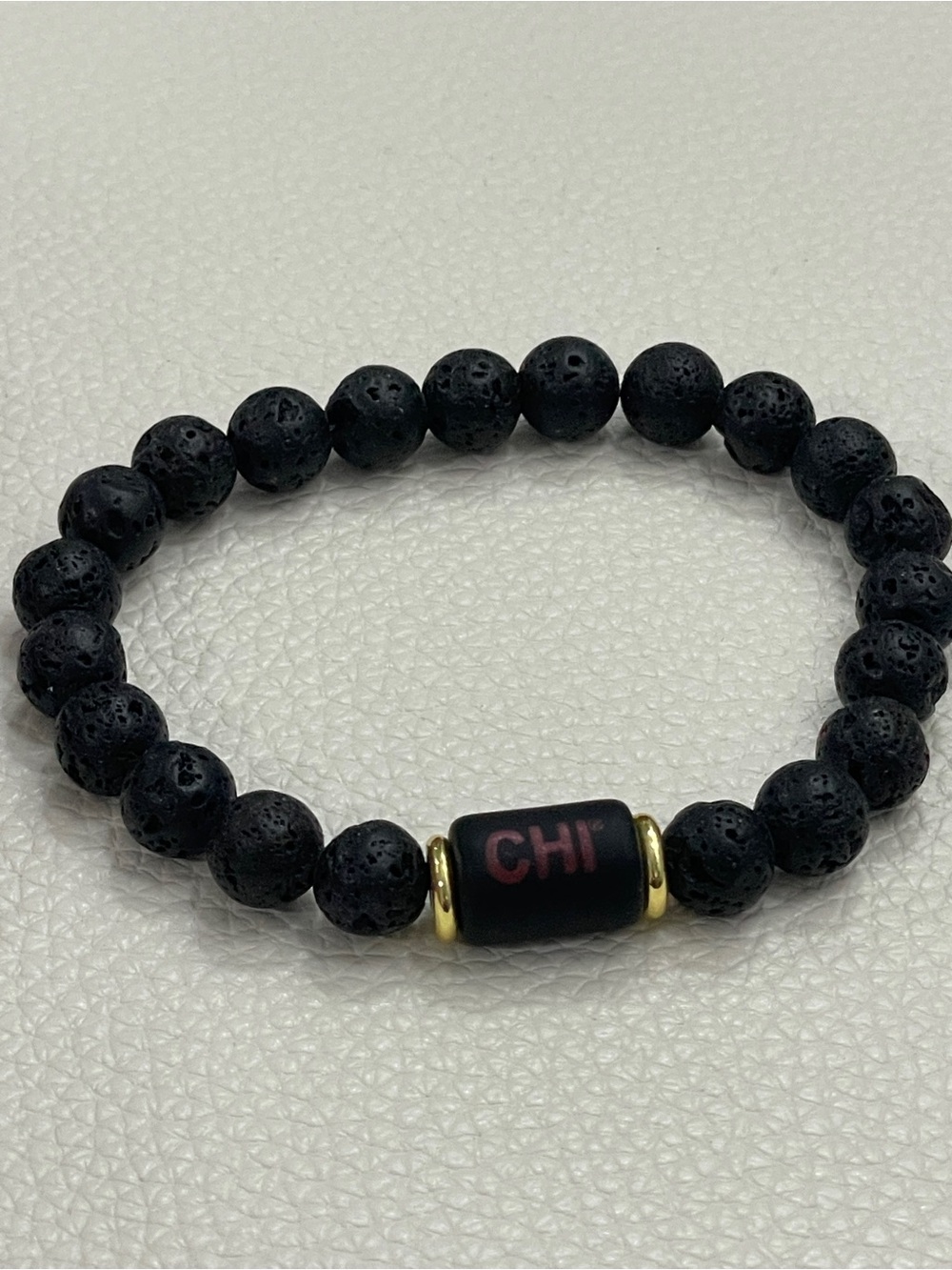 CHI Black Lava Bead Bracelet with Gold Accents